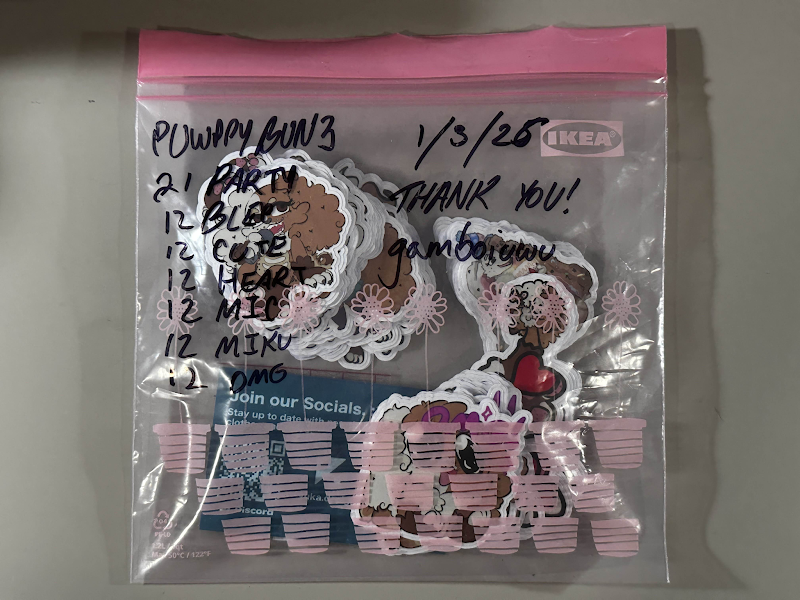 Bagged order with pink PARTY-themed stickers.