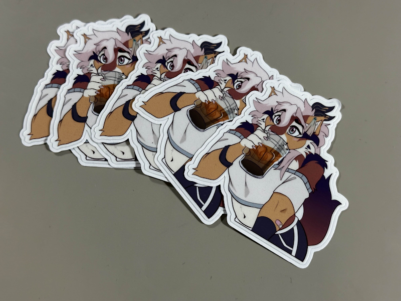 Fanned-out stack of pink-haired character stickers.
